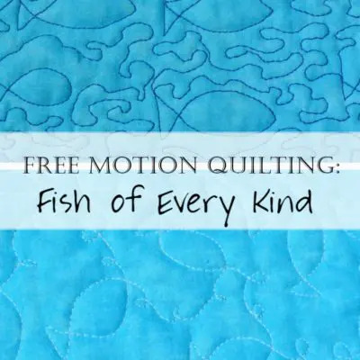 Blue quilted fabric with stitched fish motifs
