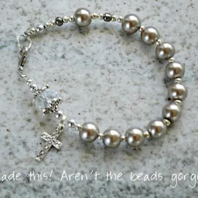 Pearl beaded bracelet with cross charm