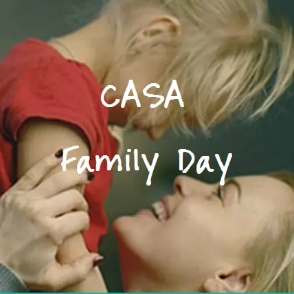 Woman and child smiling in affectionate family moment