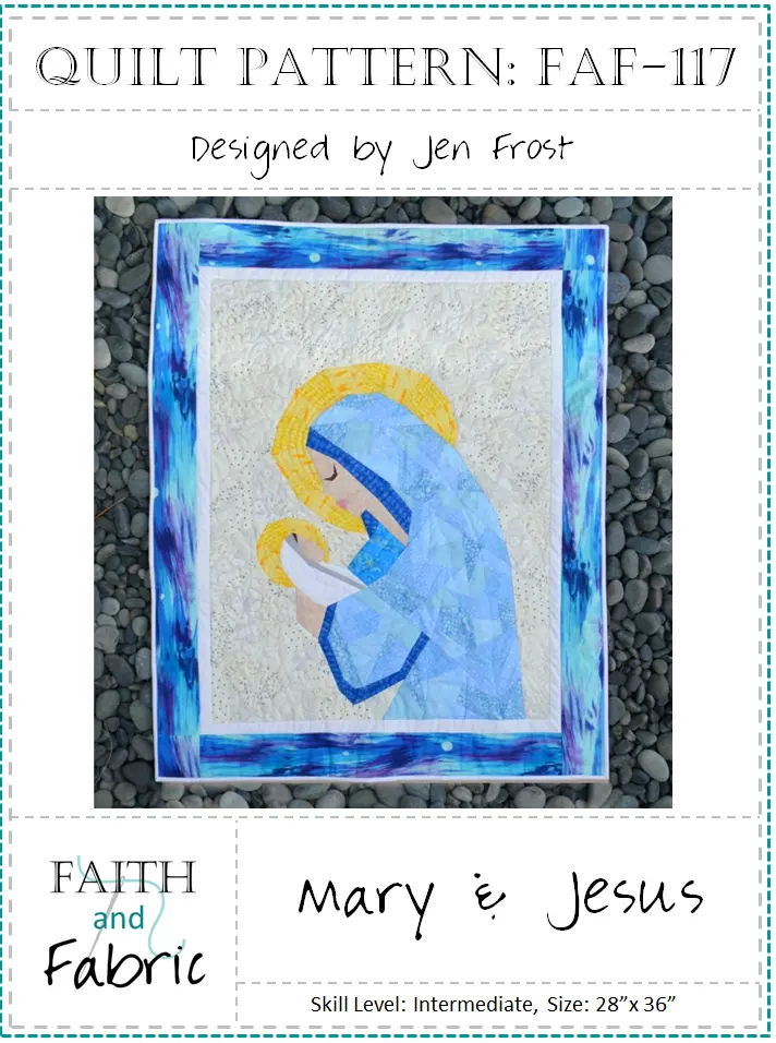 Blue quilt depicting Mary holding baby Jesus