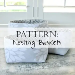 Three gray patterned fabric nesting baskets