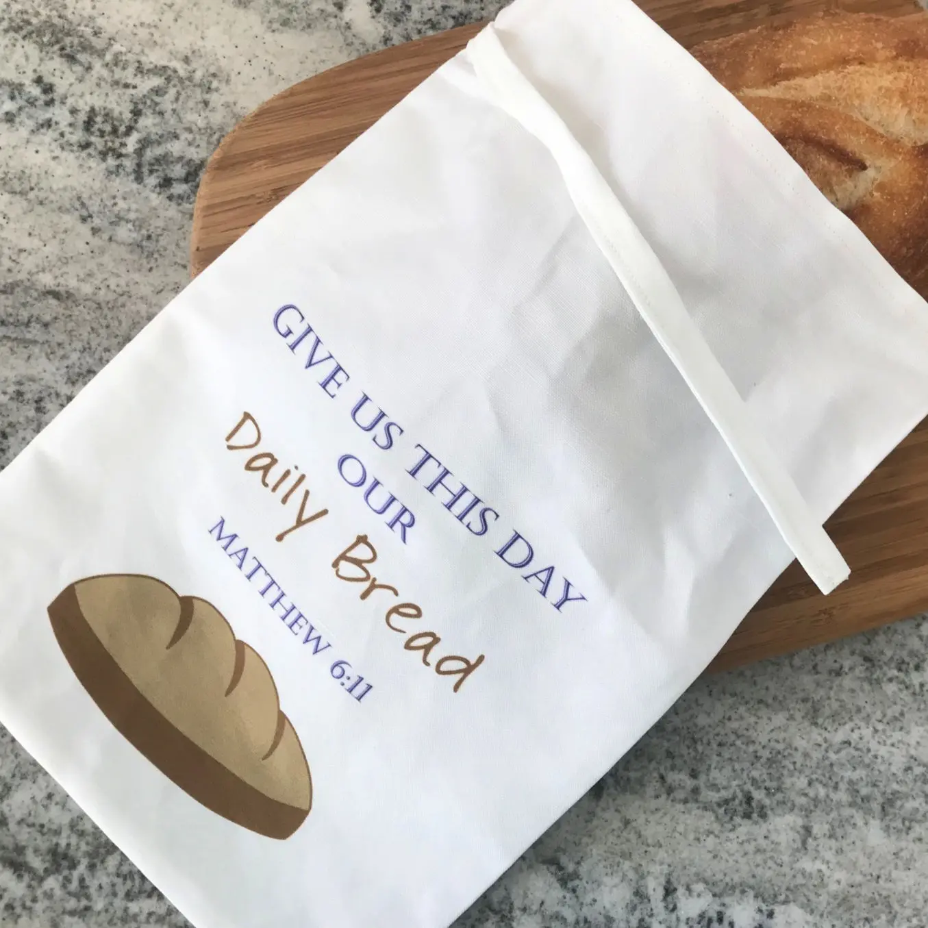 Loaf of bread in Daily Bread cloth bag